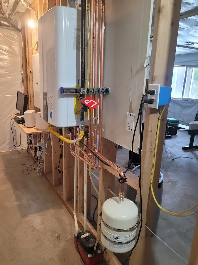 Licensed plumber repairing a kitchen sink in Halifax